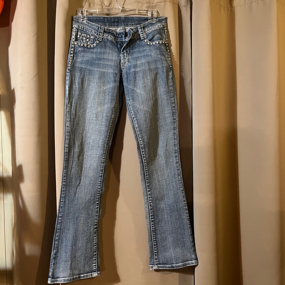 Jeans with blinged out pockets front and back.